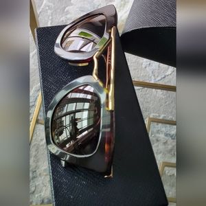 Prada aviator tortoise print sunglasses. Cinema collection with gold trimming